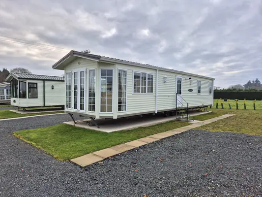 BK BLUEBIRD SHERATON 38 X 12 ON WIDE HORIZONS HOLIDAY PARK
